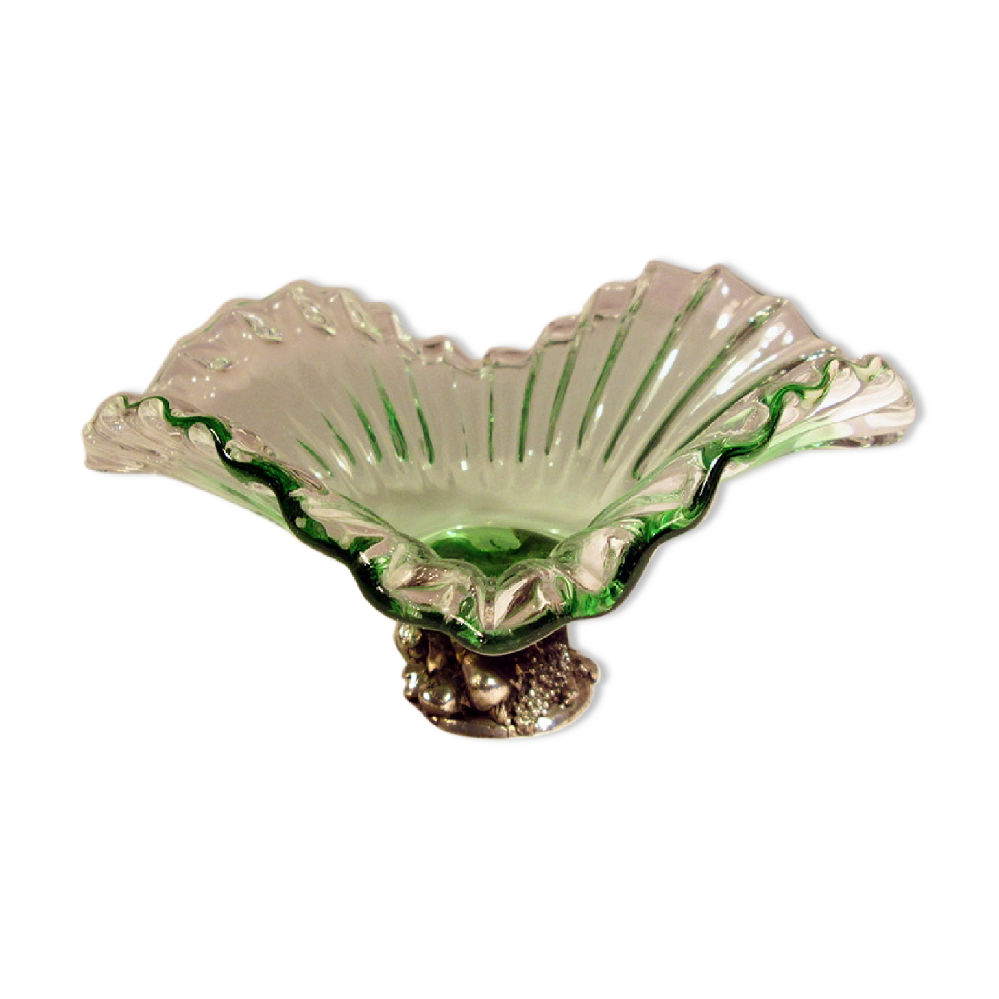 Glass cup on decorated metal stand