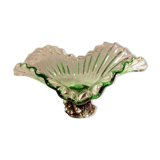 Glass cup on decorated metal stand