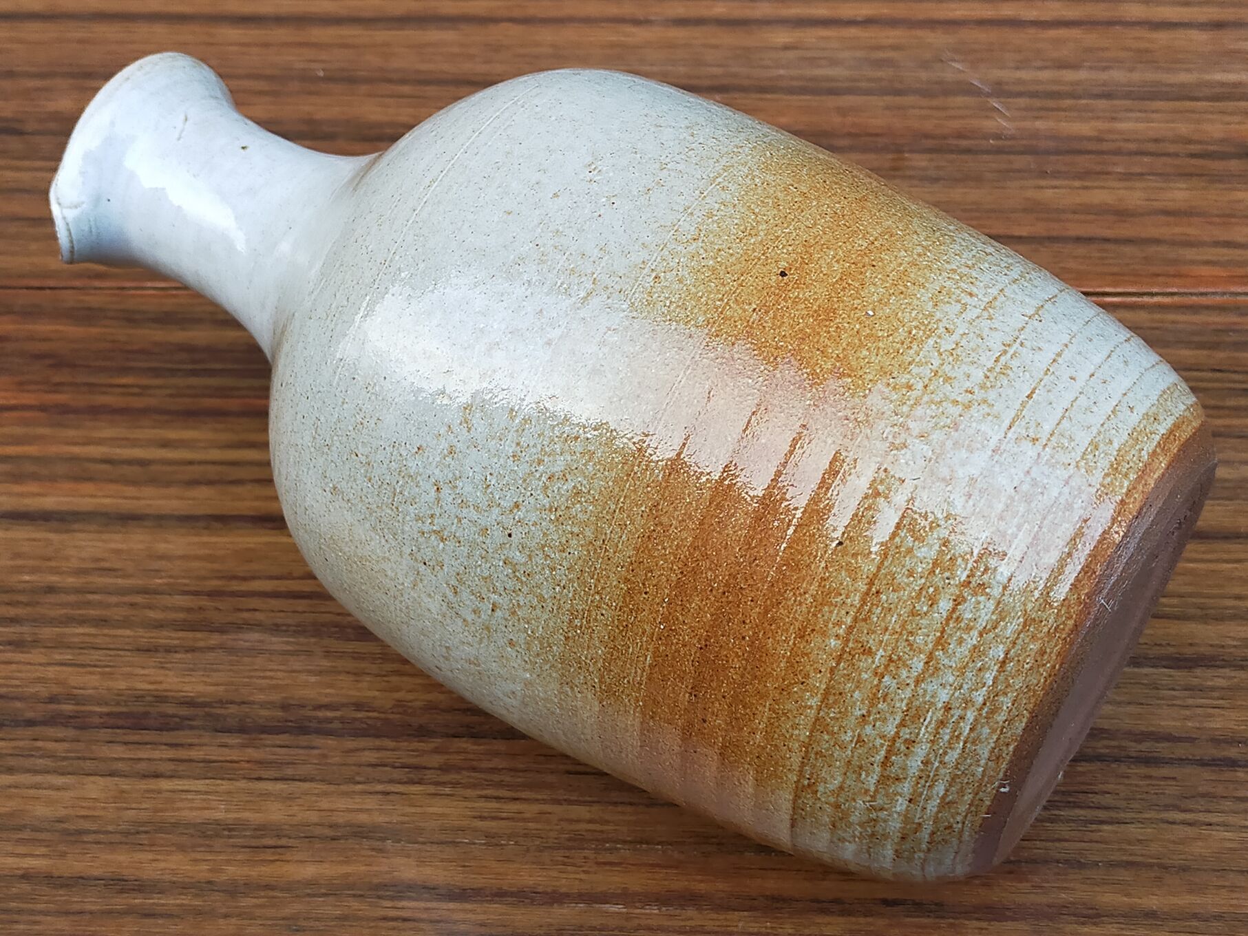 Light stoneware potter's bottle with vintage spout