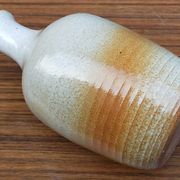 Light stoneware potter's bottle with vintage spout