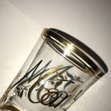 Antique gilded glass with the inscription Maman