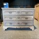 Raw wood chest of drawers