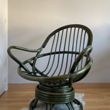 Swivel rattan armchair