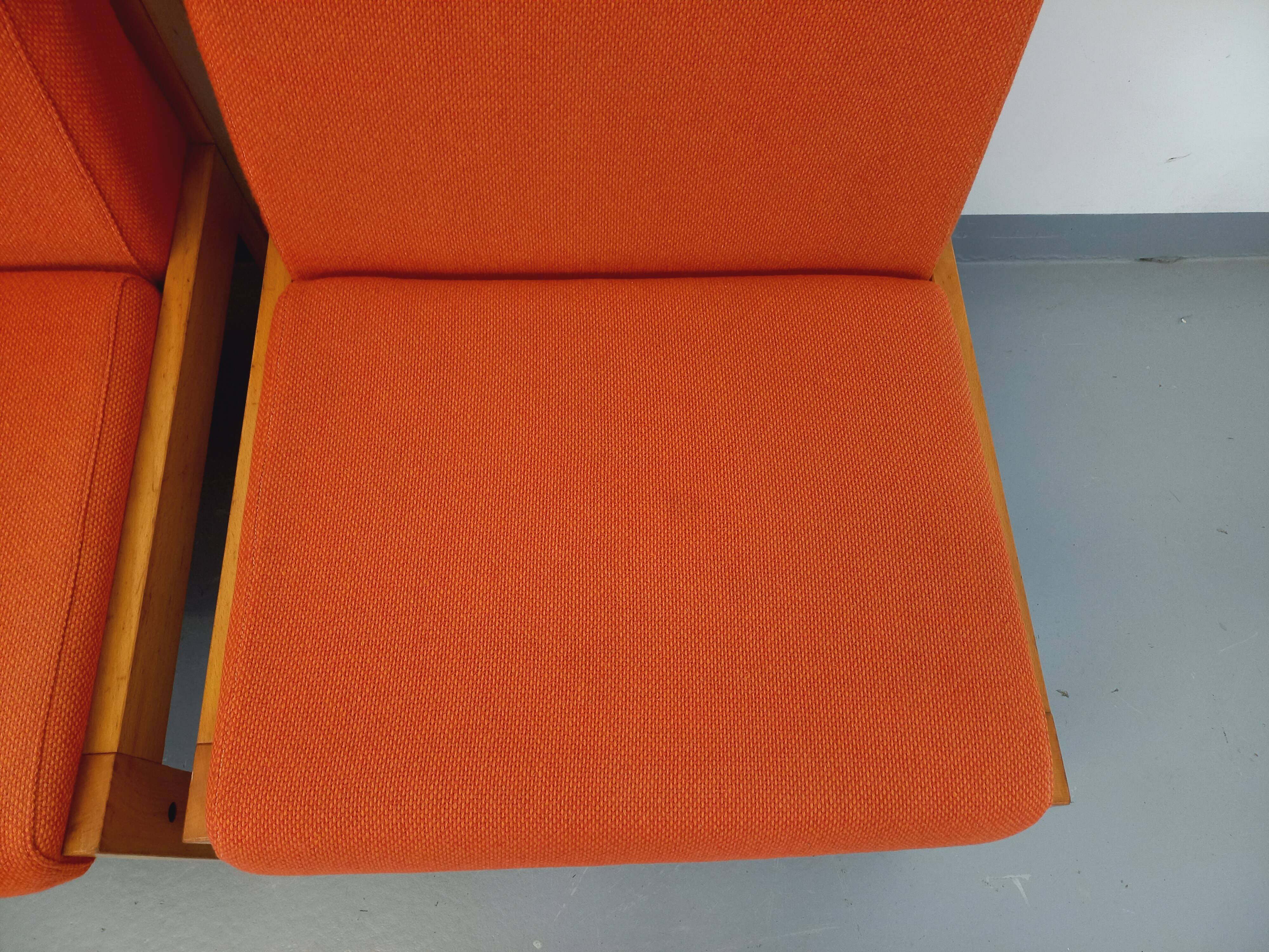 Set of 2 vintage Baumann armchairs in orange fabric and wood from the 80s