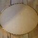Curved oval frame with blue butterfly