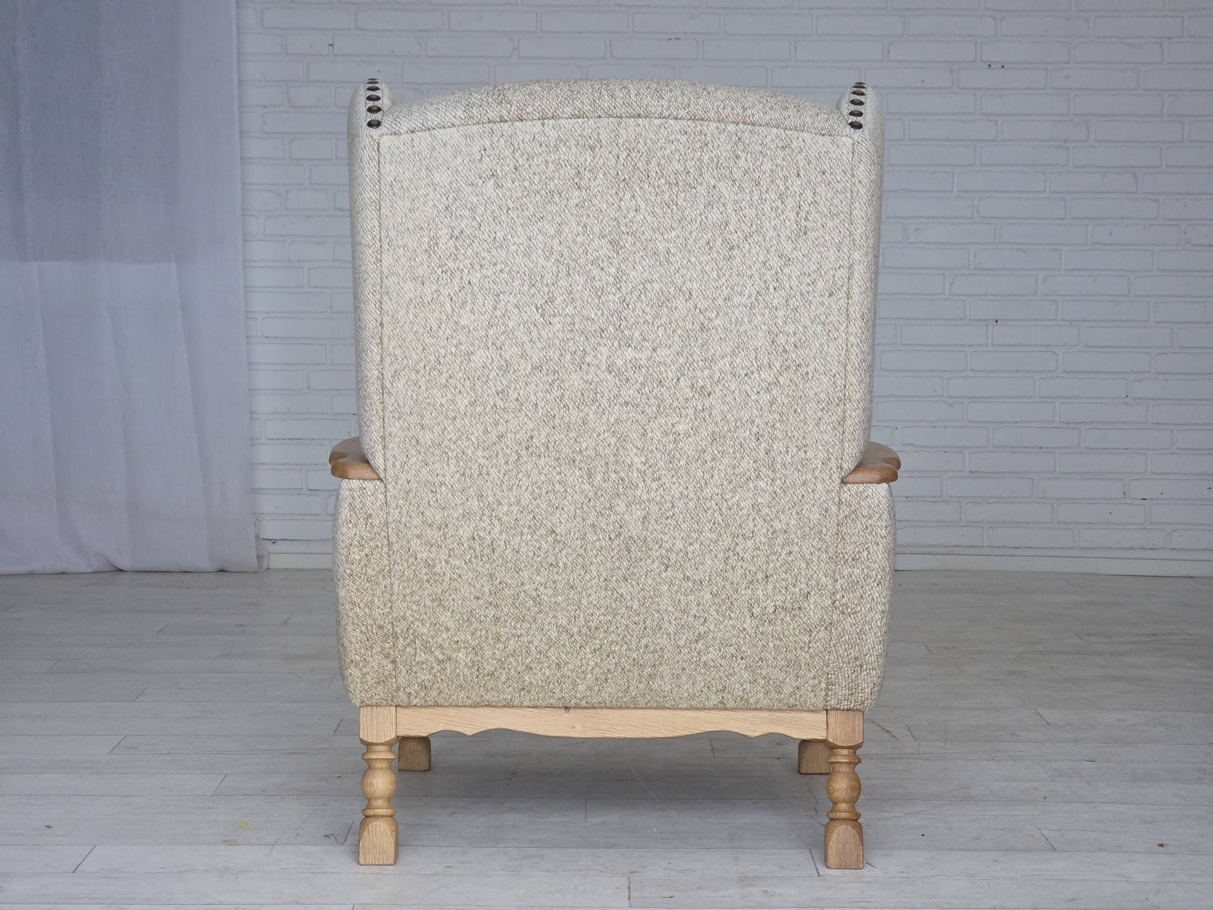 1970s, Danish highback armchair, furniture wool, solid oak wood.