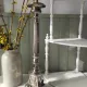 Old church candlestick in silver-plated metal