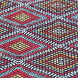 Handmade multicolored diamond patterned kilim rug in natural wool