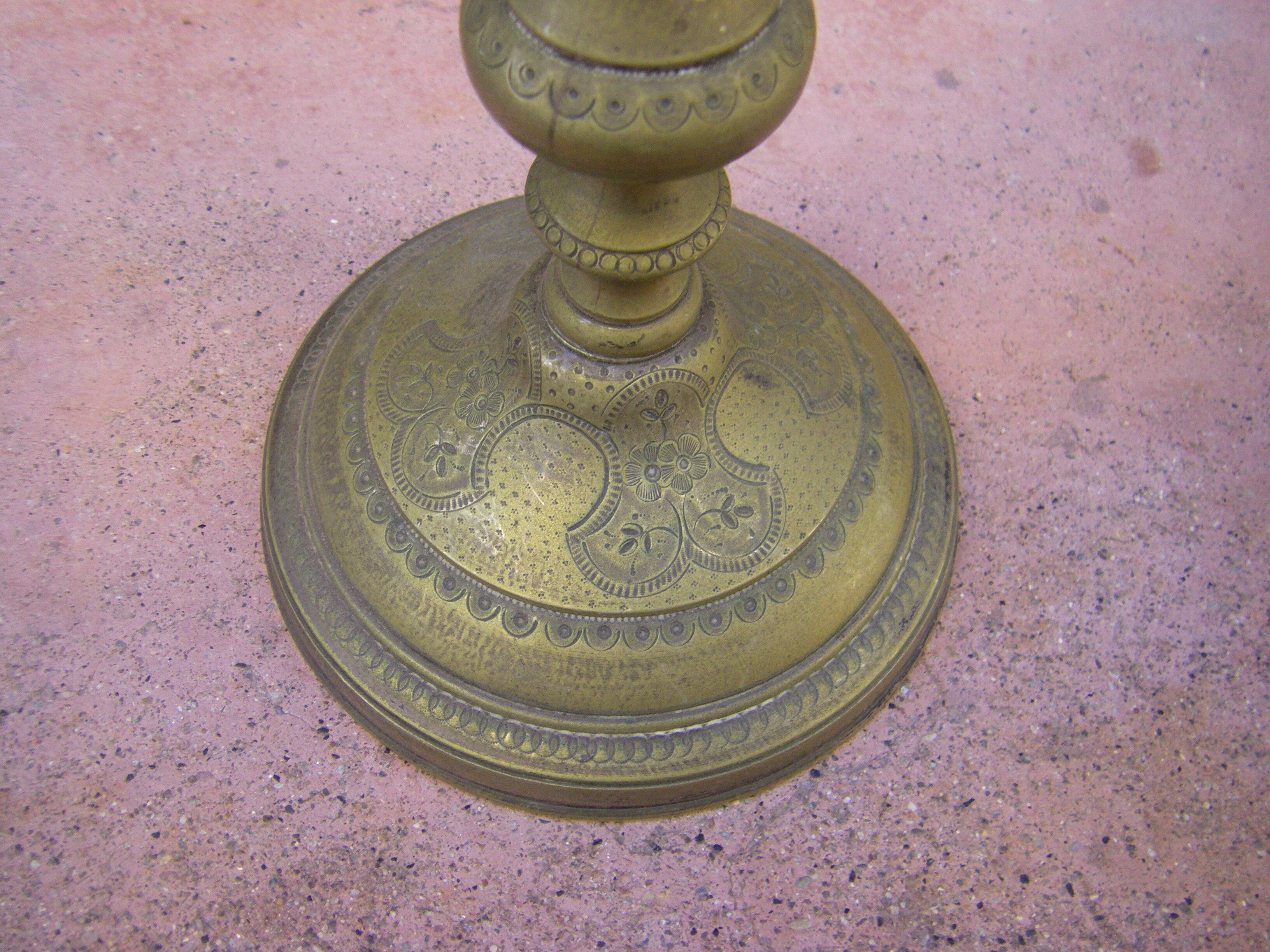 Pair of candle holders with oriental decoration