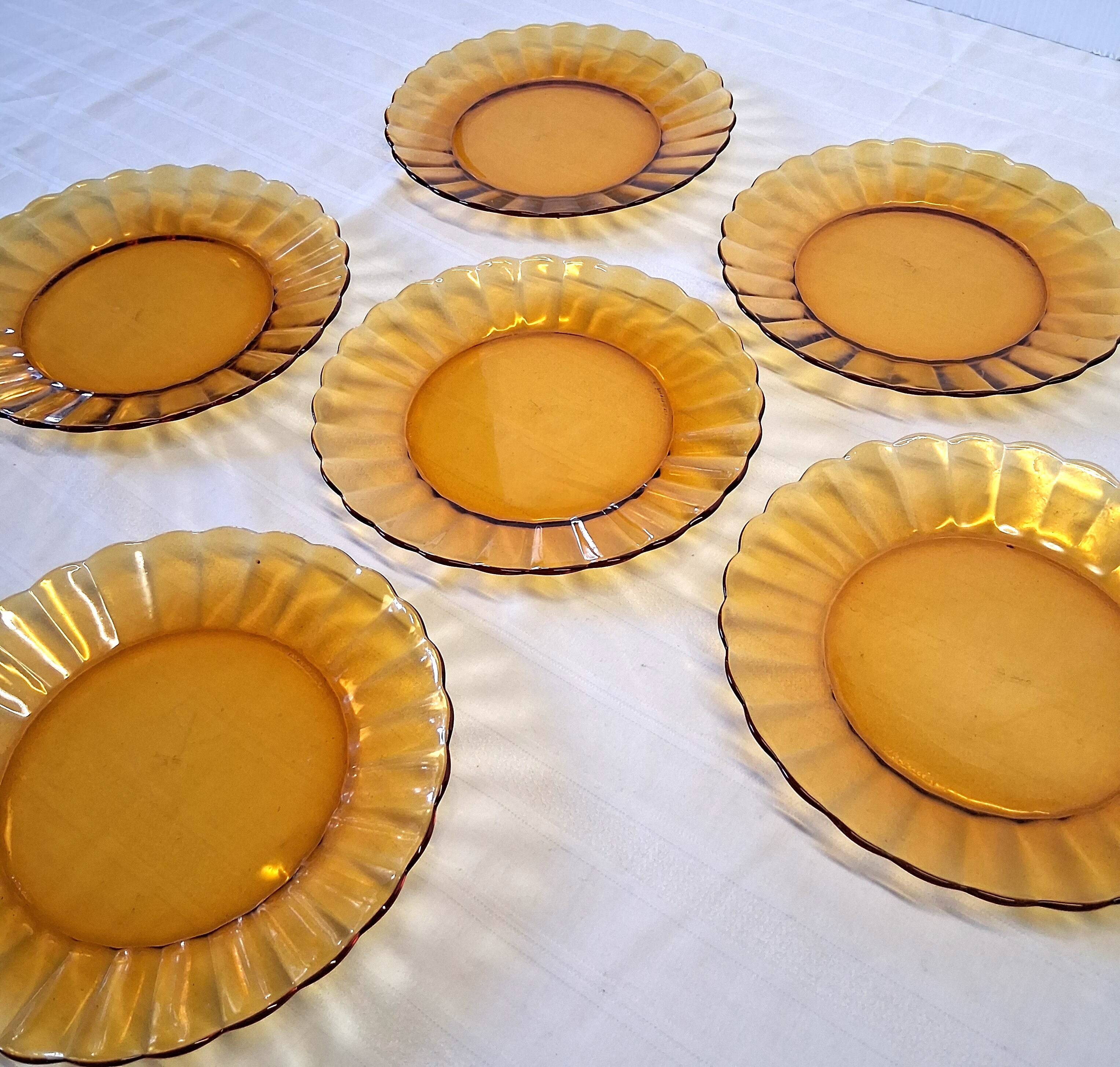 6 Duralex dessert plates in good condition, made of amber-yellow glass