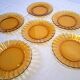 6 Duralex dessert plates in good condition, made of amber-yellow glass