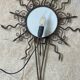 Luminous wrought iron sun mirror