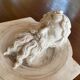 Two moulds; plaster heads