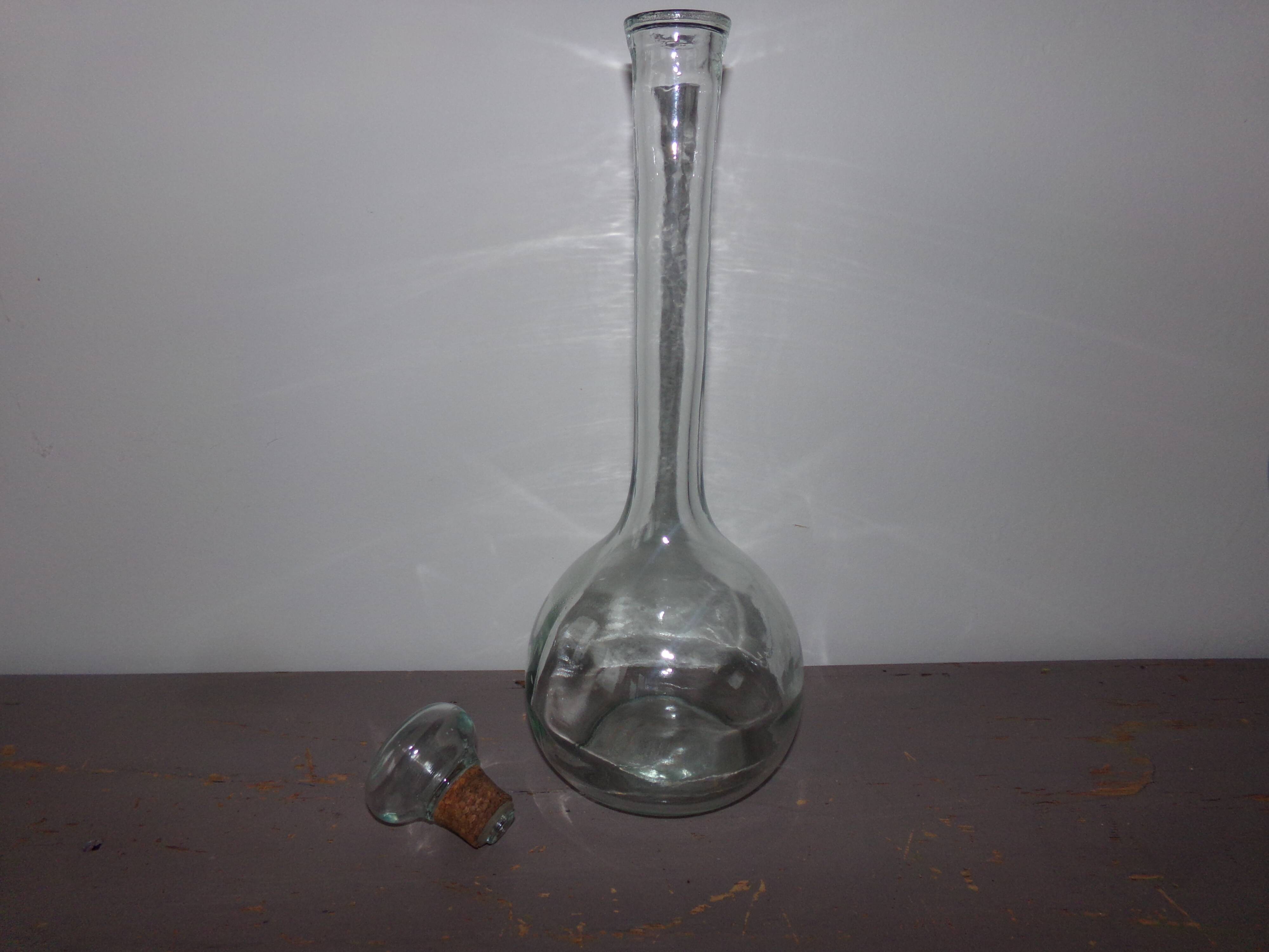 Glass bottle with its cap