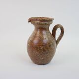Brown speckled stoneware pitcher in very good condition