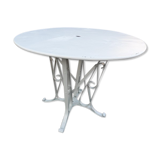 Wrought iron garden table riveted feet 1910