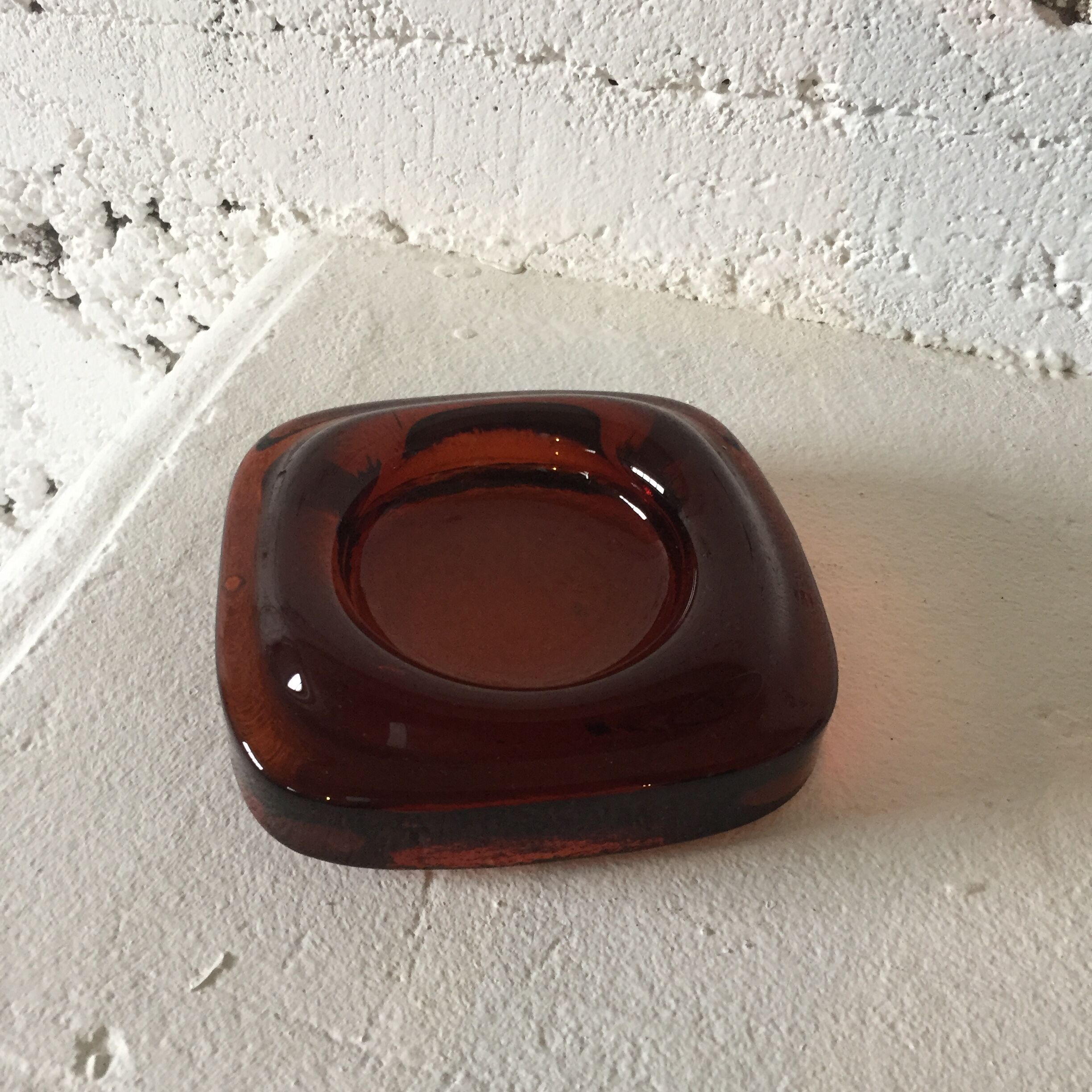 Brown glass ashtray