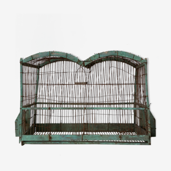 Green old wooden cage