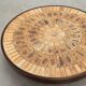 Round coffee table by Roger Capron