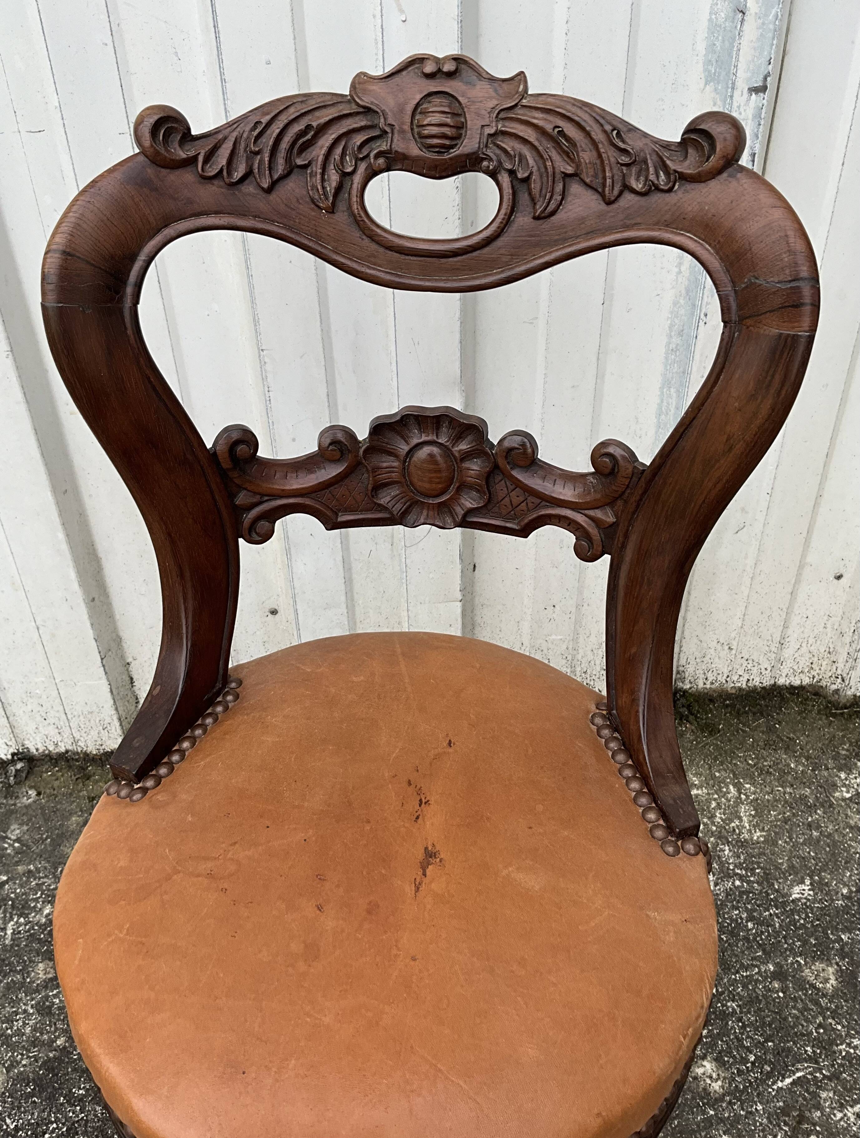 Mid-19th century solid walnut harpist's chair