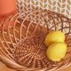 Vintage woven wicker round basket for fruits or bread.