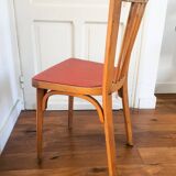 Baumann chair stamped in red skai