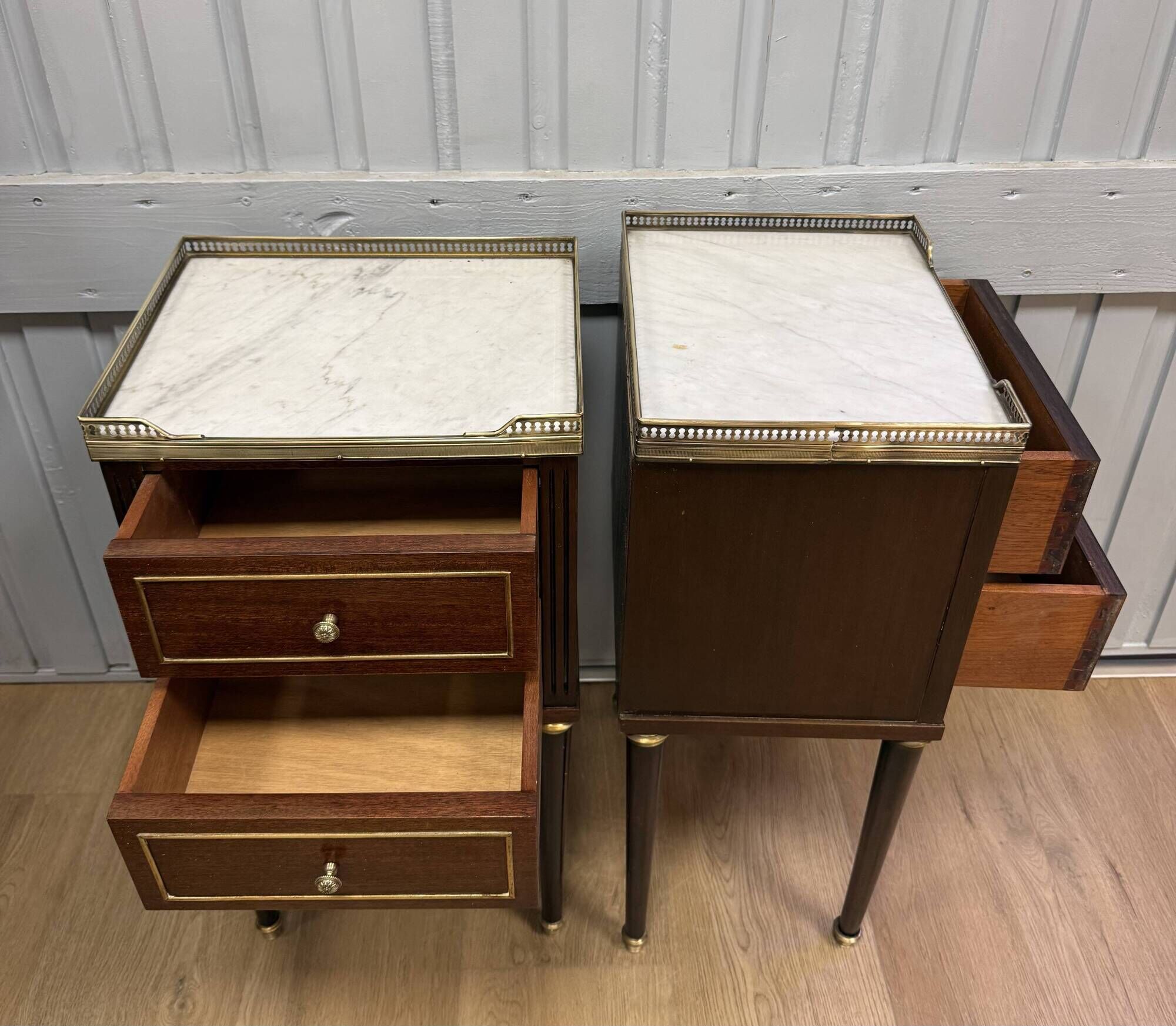Pair of Louis XVI style bedside tables in mahogany