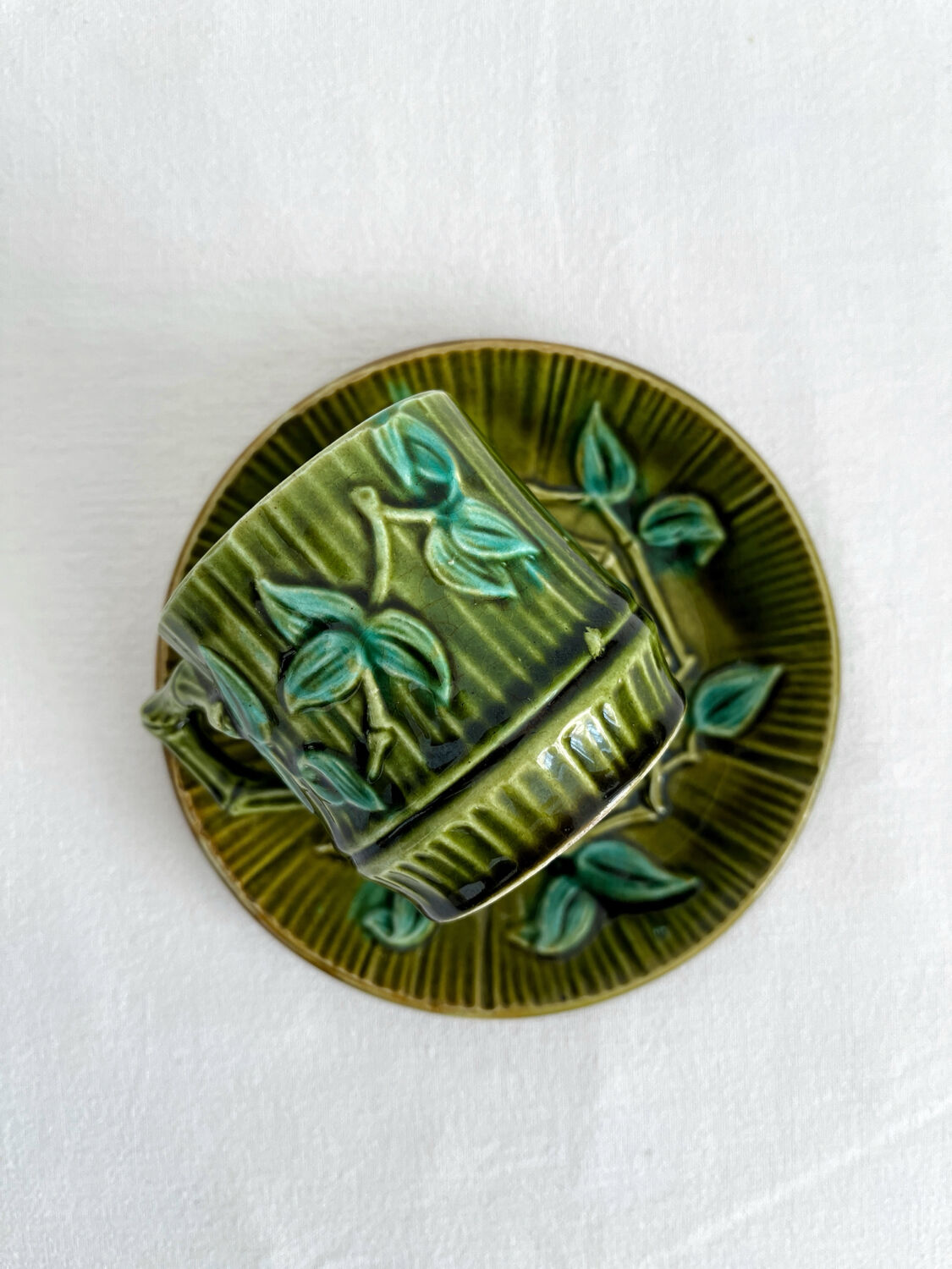 Antique earthenware coffee cup in bamboo slip