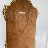 Large golden mirror parecloses