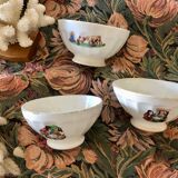 Old bowl decorated with a farmer and her cow