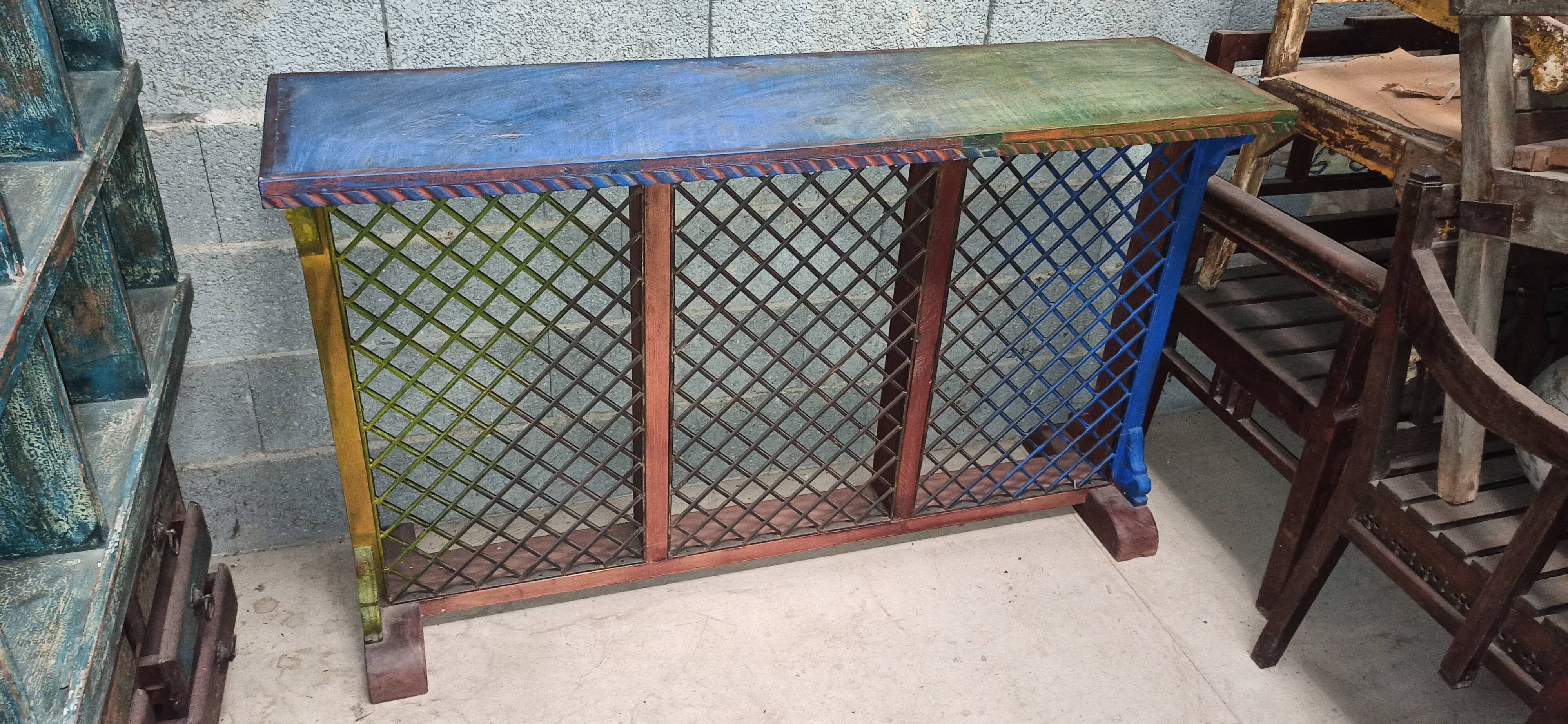 Colorful old standing eat with cast iron grill