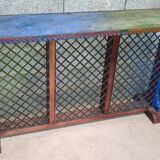 Colorful old standing eat with cast iron grill