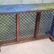Colorful old standing eat with cast iron grill