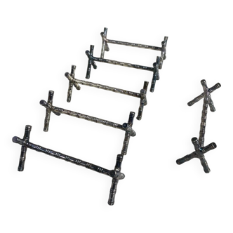 Six bamboo-patterned metal silver-plated knife rests.