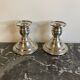 Pair of silver metal candlesticks