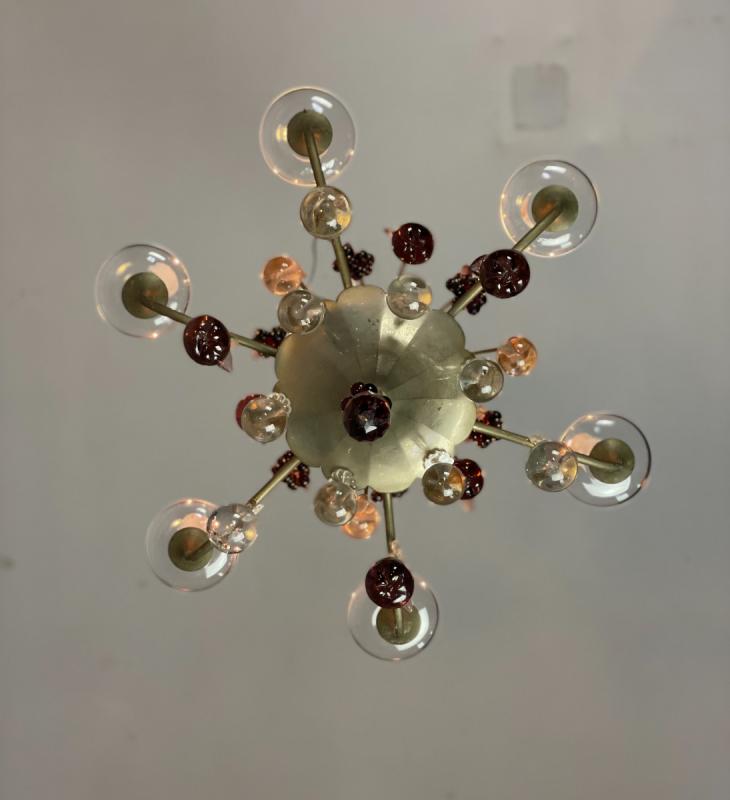 Silver bronze lustre garnished with pampilles, fruits and balls