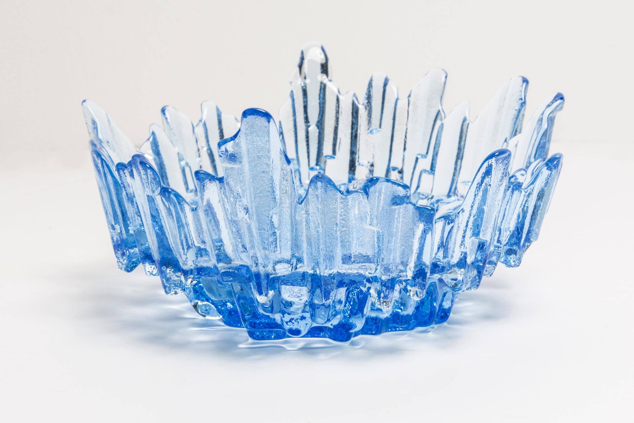 Vintage decorative plate in light blue glass, Italy, 1960s.