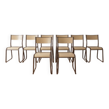 Set of 8 vintage industrial style chairs in metal and wood.