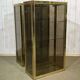 Pair of display cases in gilded chrome and smoked glass - 1980s