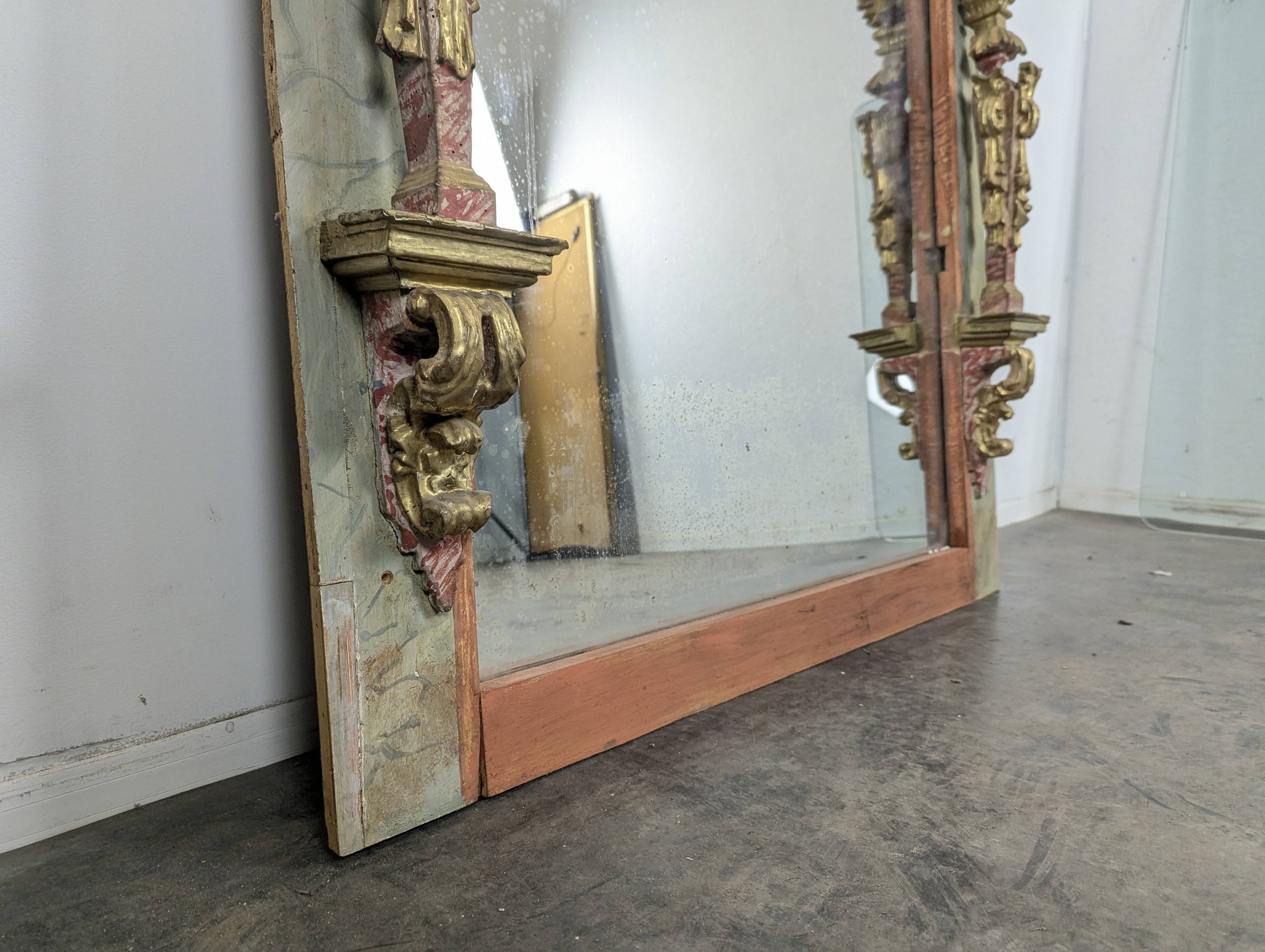 Large trumeau altarpiece composition of woodwork from the 18th century.