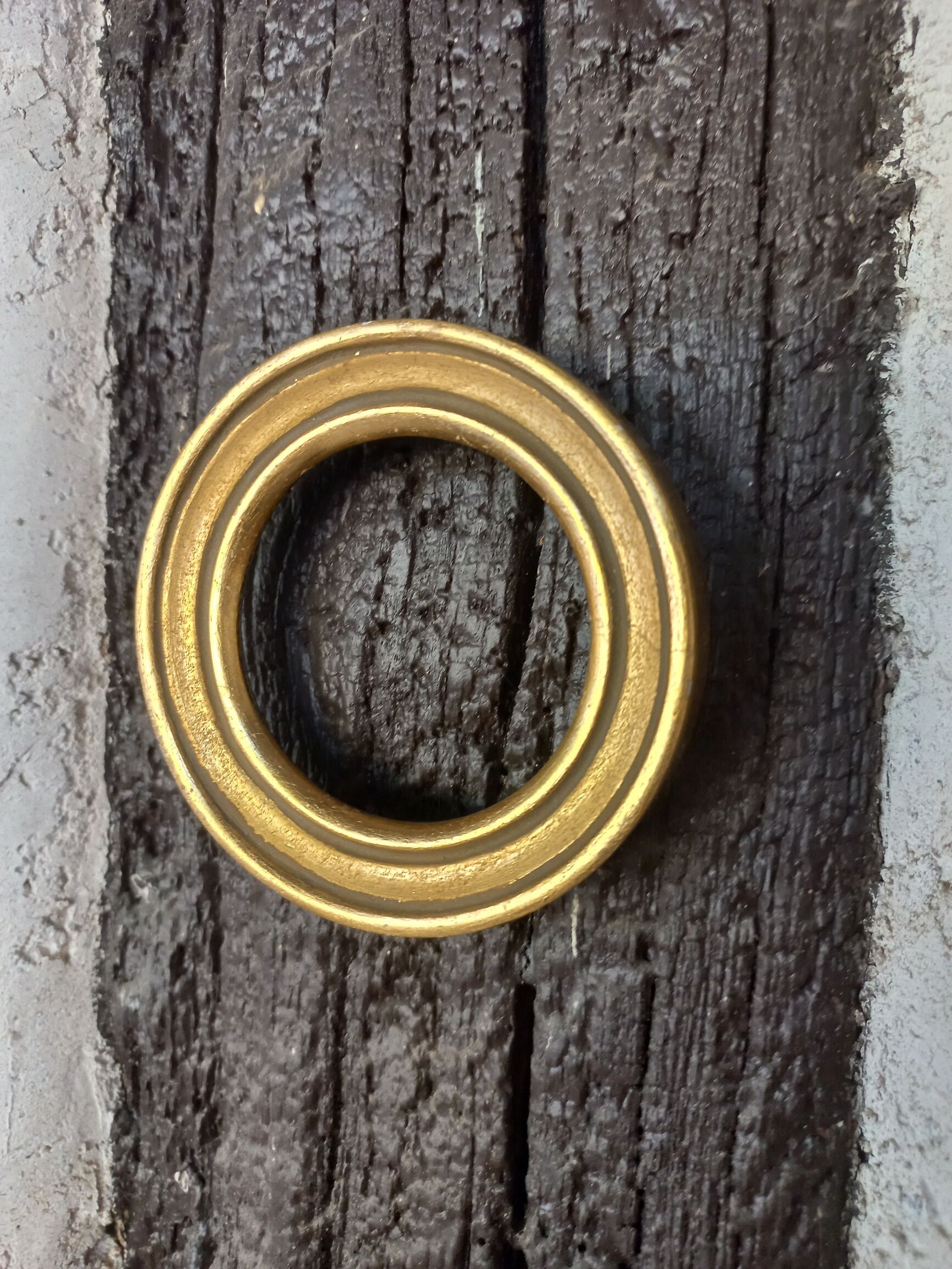 Pair of small round gilded frames