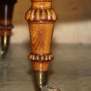 High Victorian leather tête-à-tête canapé with a walnut burr chessboard.