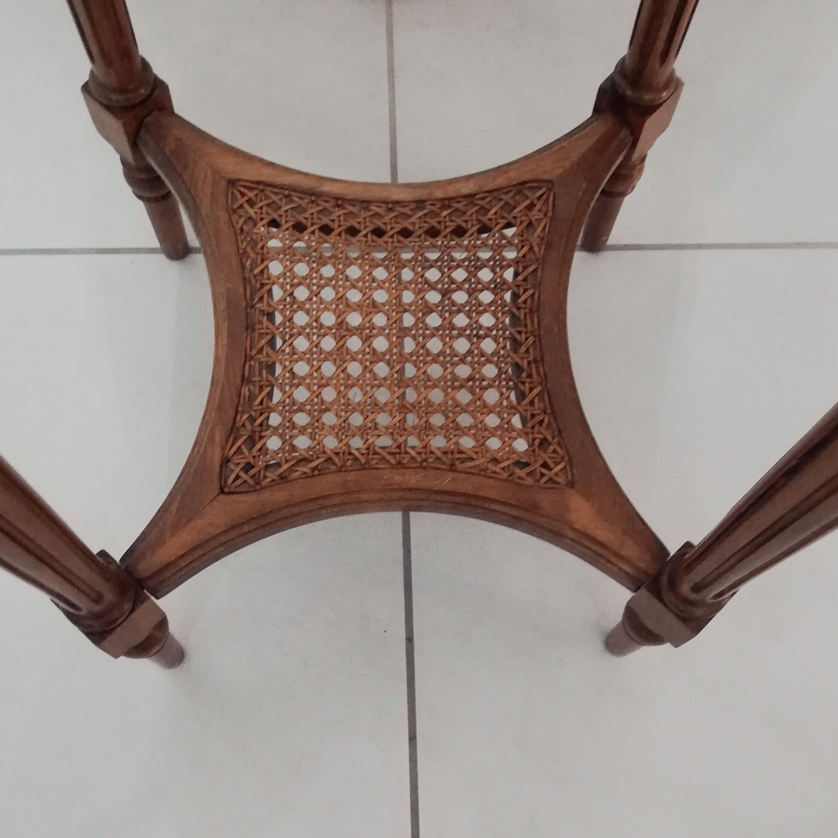Wooden pedestal table carved in the Louis XVI style