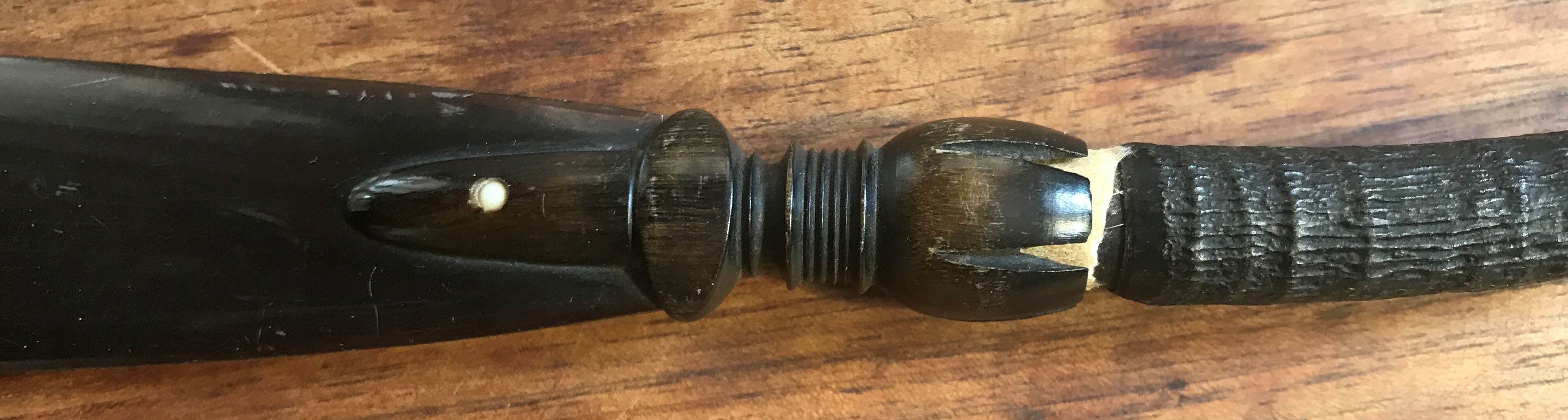 paper cutter in horn and wood. XIX century