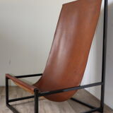 Pair of vintage armchairs in stretched leather and metal structure