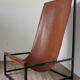 Pair of vintage armchairs in stretched leather and metal structure