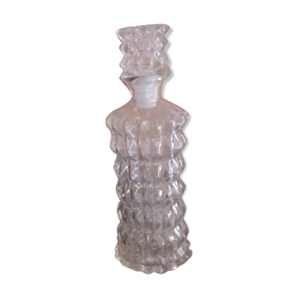 Chiseled glass decanter with cap