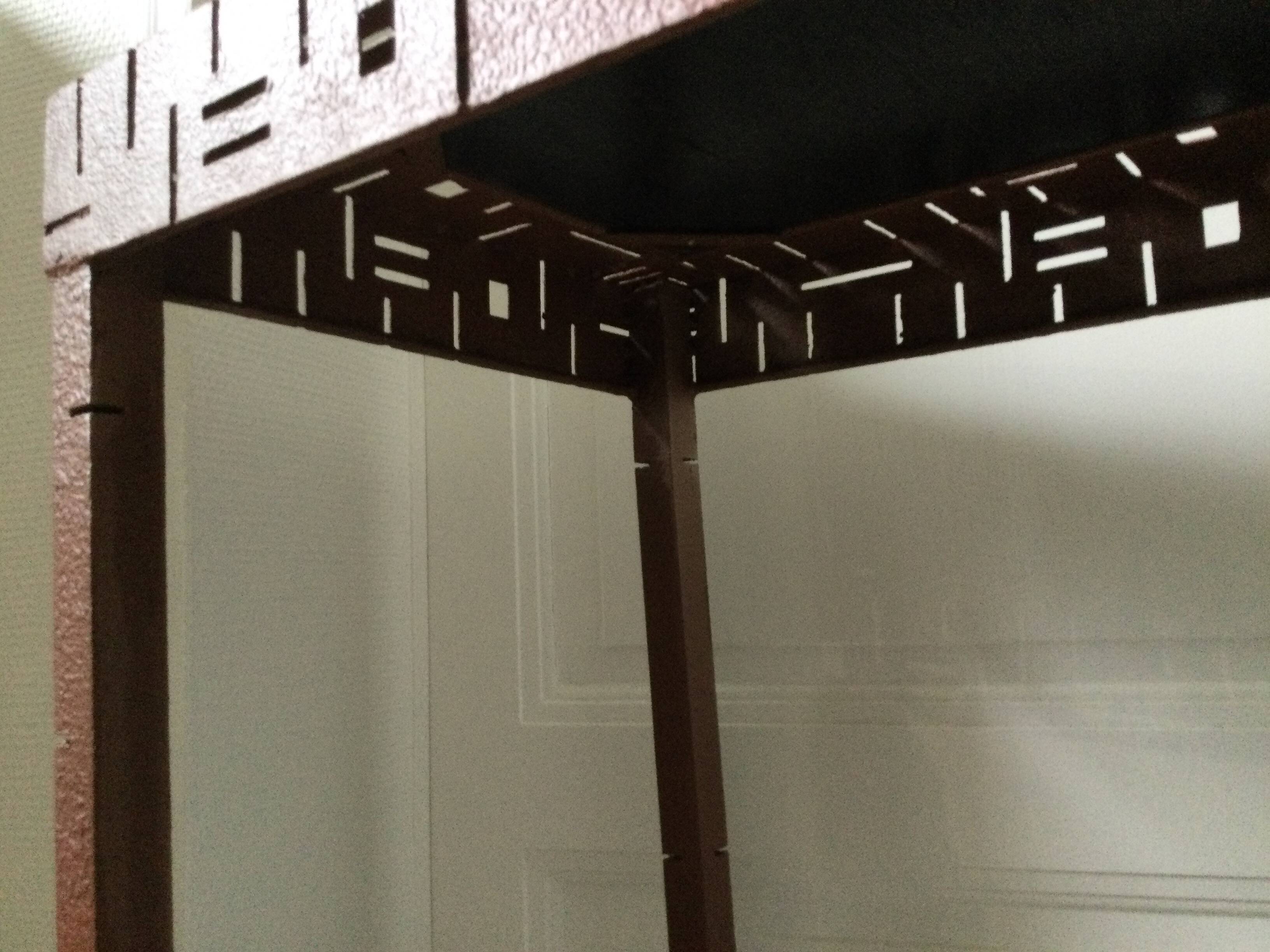 Perforated sheet metal and wood console