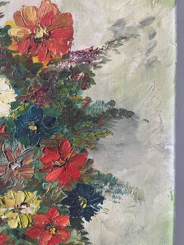 Bouquet de fleurs dans un vase bleu, signé