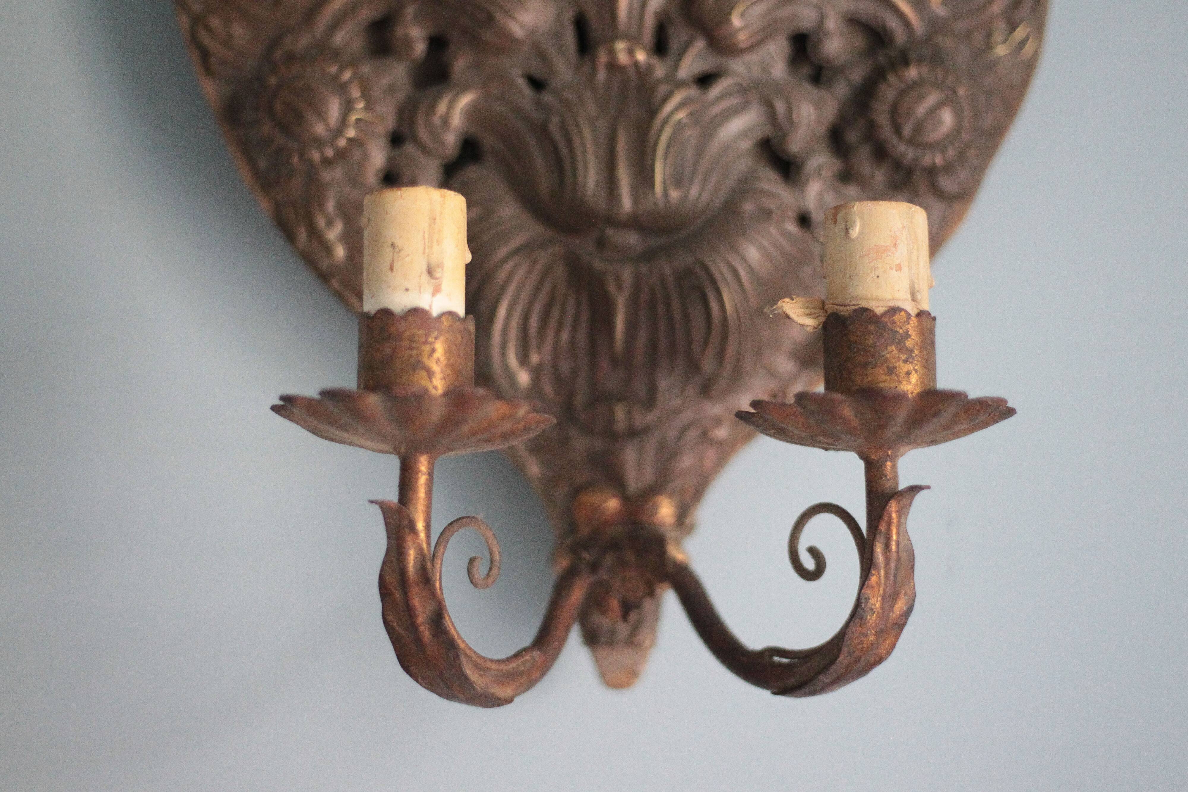 Pair of wall sconces in embossed brass with floral patterns, wall lamp, sconce.